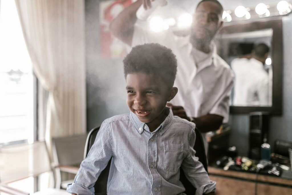 Do you offer services for kids and men, like fades and beard trims?
